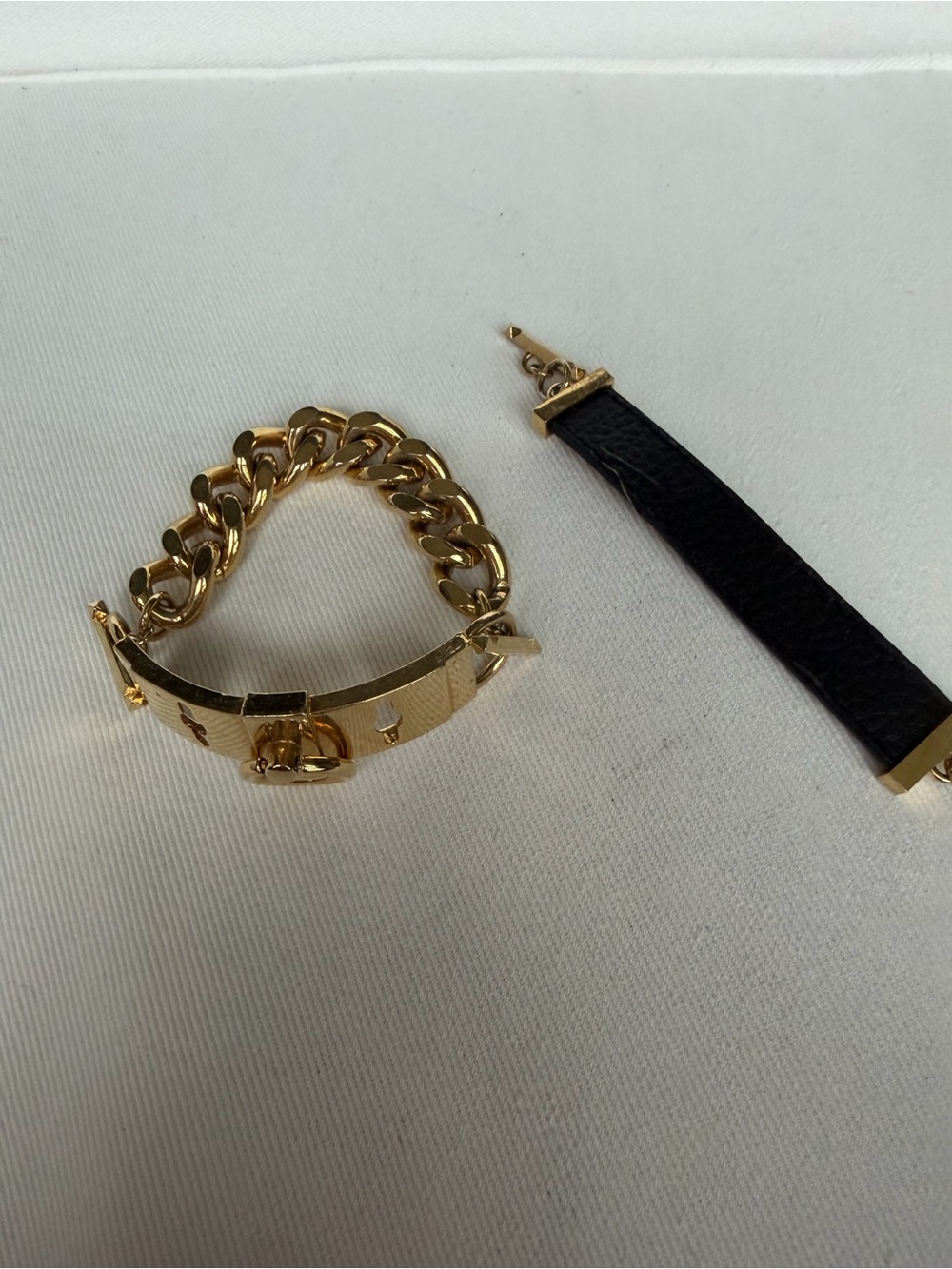 BCBGMaxAzria Gold Chain Bracelet with Black Leather Strap Accent
